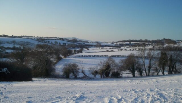 Beautiful snowy view of rural Rookley